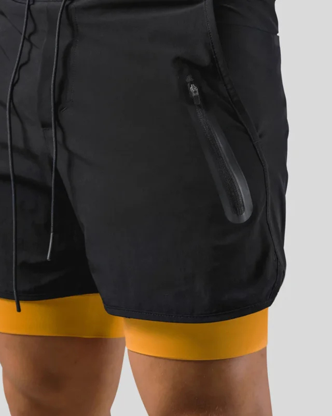 מכנסי טייץ דגם הידרו צבע שחור כתום